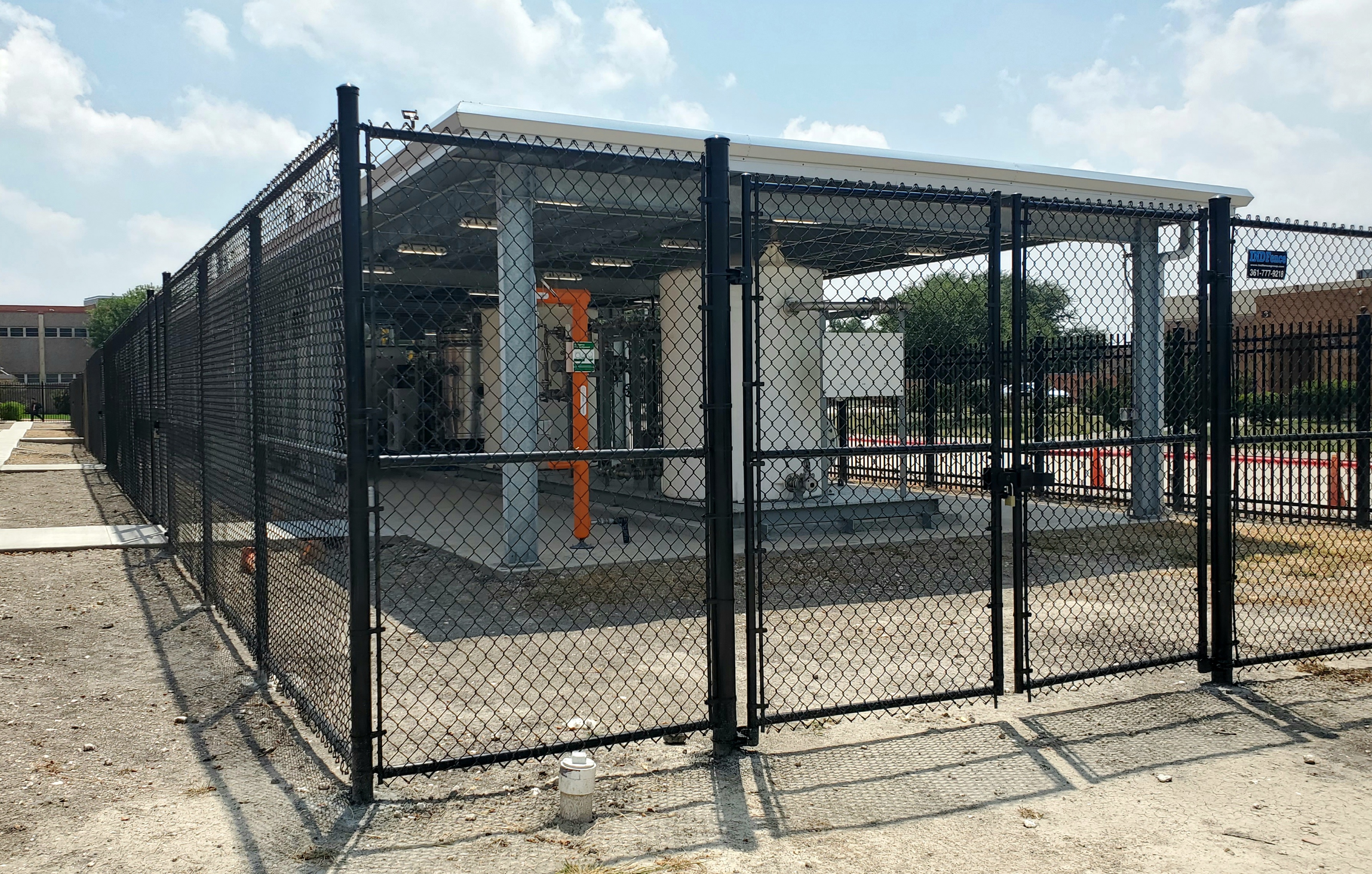 Commercial chain-link perimeter fence installation