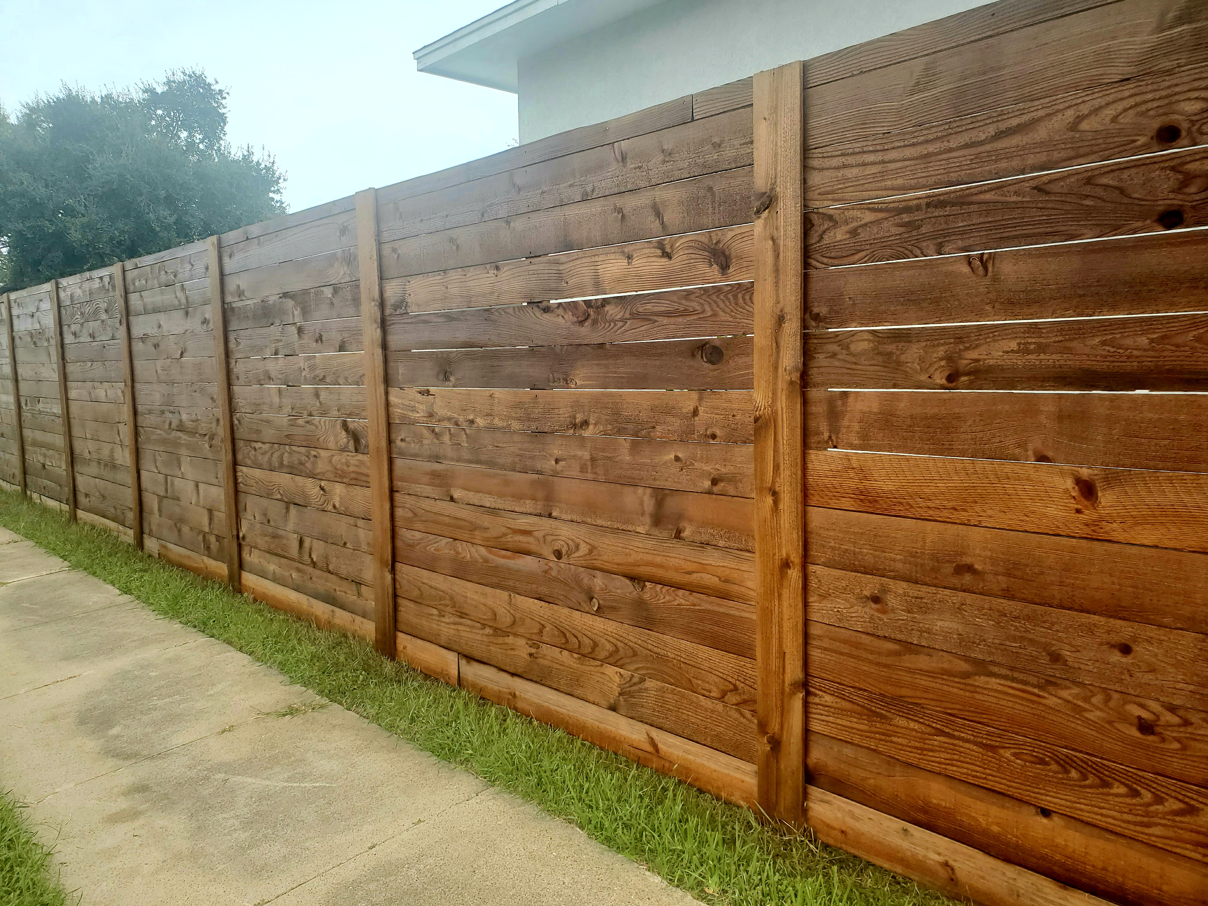 Wood fence staining preparation and application